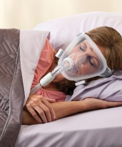 sluup apnea patient using Respironics FitLife Total Face Mask with Headgear